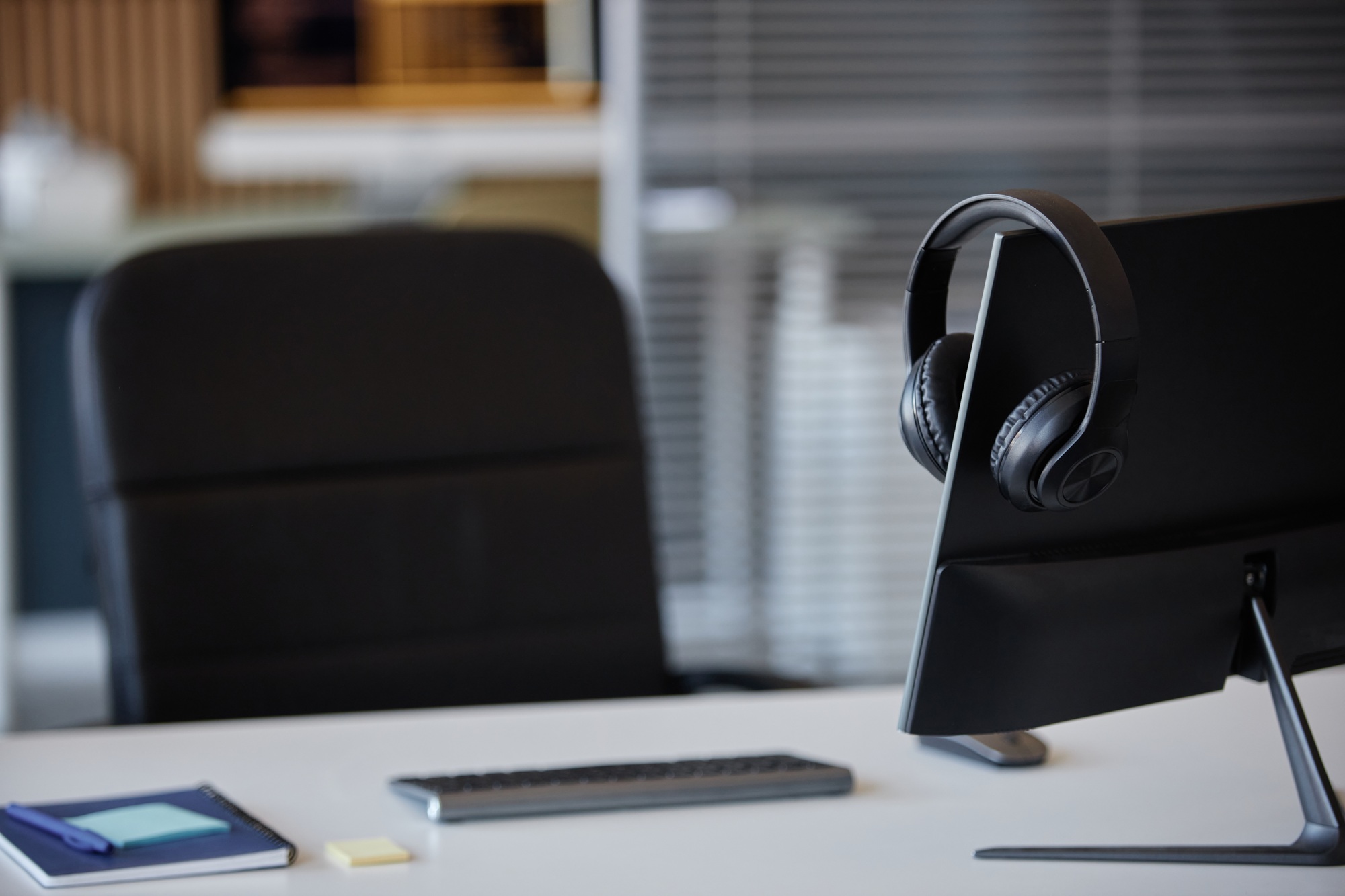 Modern Office Desk with Computer and Headphones